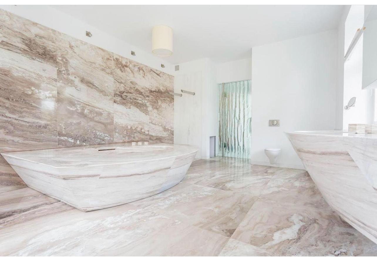 Bathroom with bath and double vanity — Suddeco Homes project archive