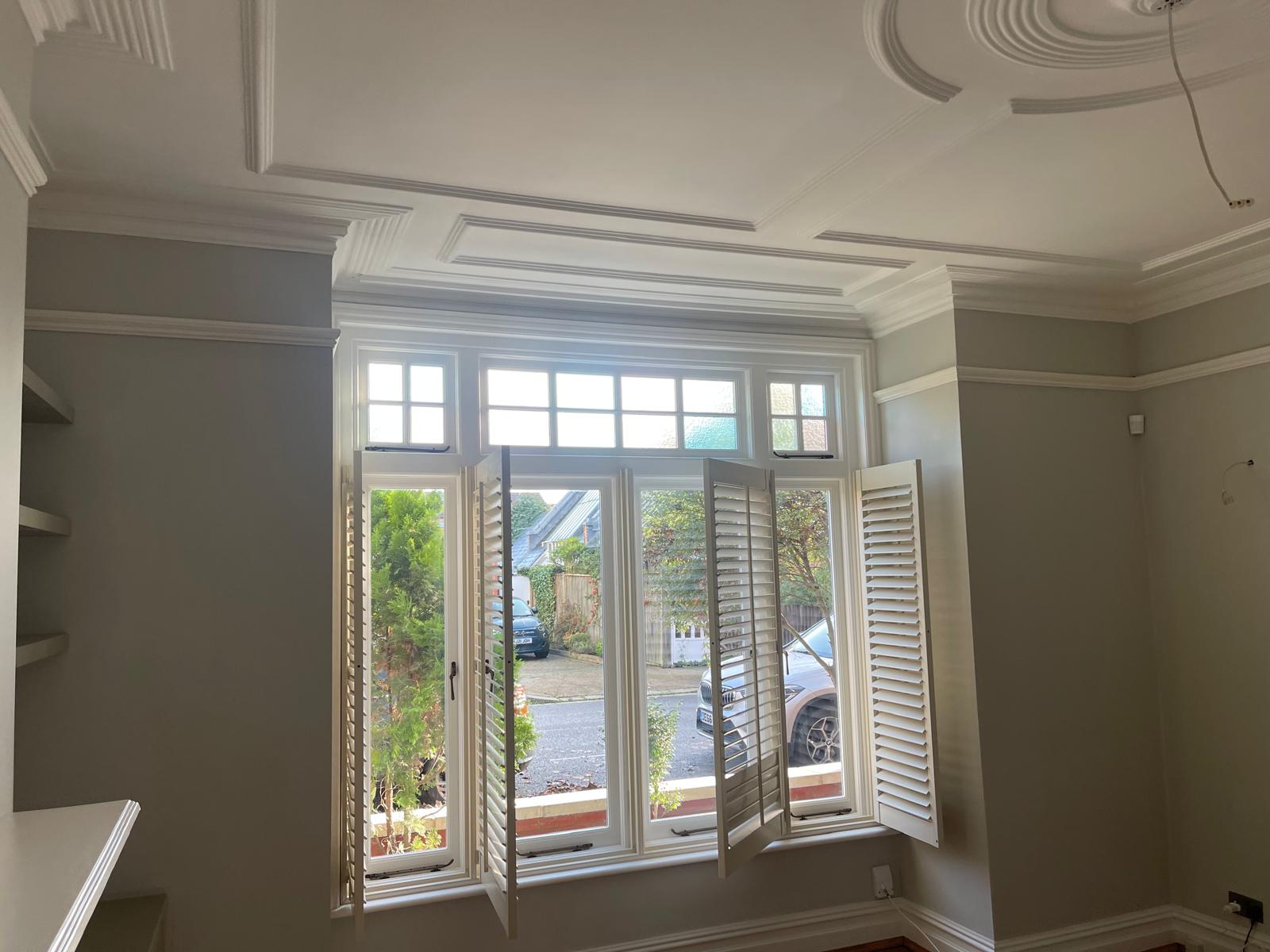 Glazed garden doors with shutters and daylight — Suddeco Homes project archive